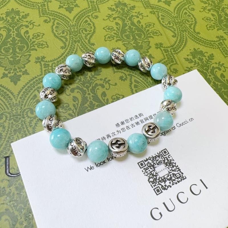 G*u*i bracelets